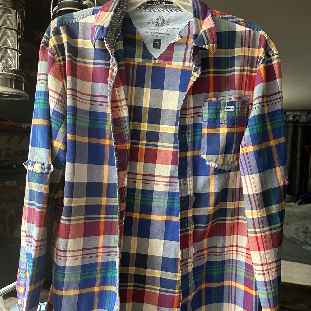 This is a Parish vintage button down shirt.